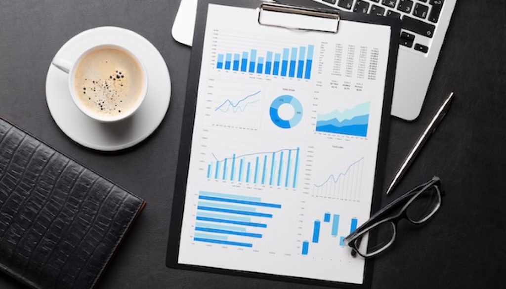 Office workplace table with charts