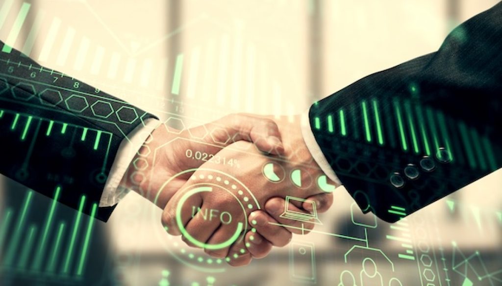 Double exposure of tech hologram and handshake of two men. Deal concept. Sermaye Piyasaları Büyüyor, Yatırımcı İlişkileri Stratejik Role Koşuyor